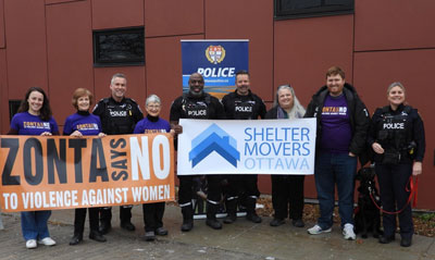 At the Huntmar station, club Zontians Kathleen Kardasz, Judith Ainsworth, Elspeth Nickle and Tyler Smith joined officers for a photo with the Zonta Says NO banner. Present were Inspector Isabelle Lemieux, OPS support dog Cindy, Acting Staff Sergeant Andrew Pidcock, Sergeant John Drader, and Constable Darren Joseph, all proudly standing together to send a clear message: violence against women will not be tolerated.